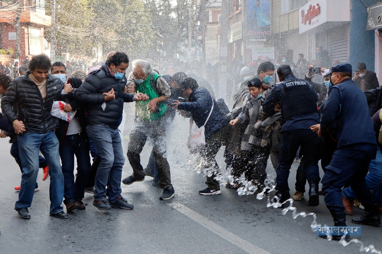 Police use force on civil activists in Baluwatar against the dissolution of the House of Representatives.